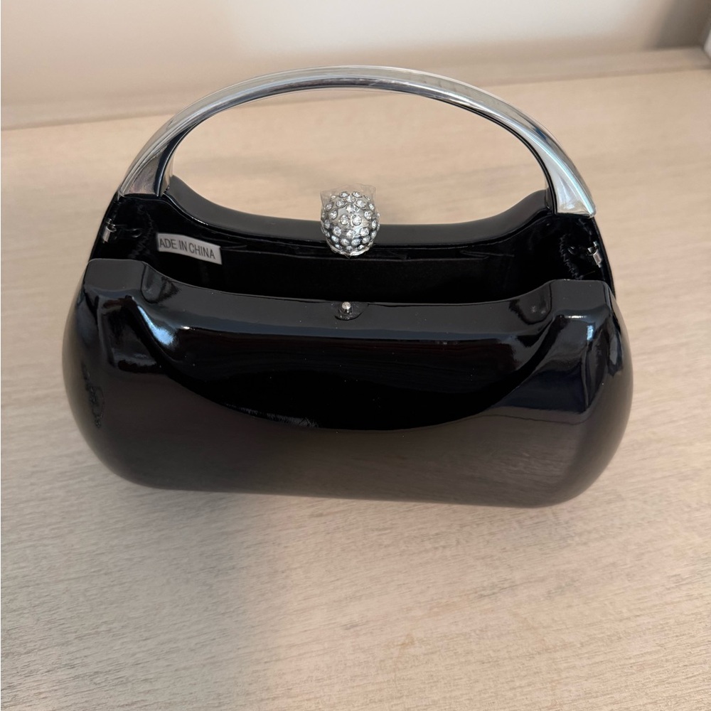 Elegant Black Handbag with Silver Accents (hard case)